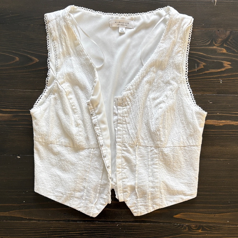 White fitted vest